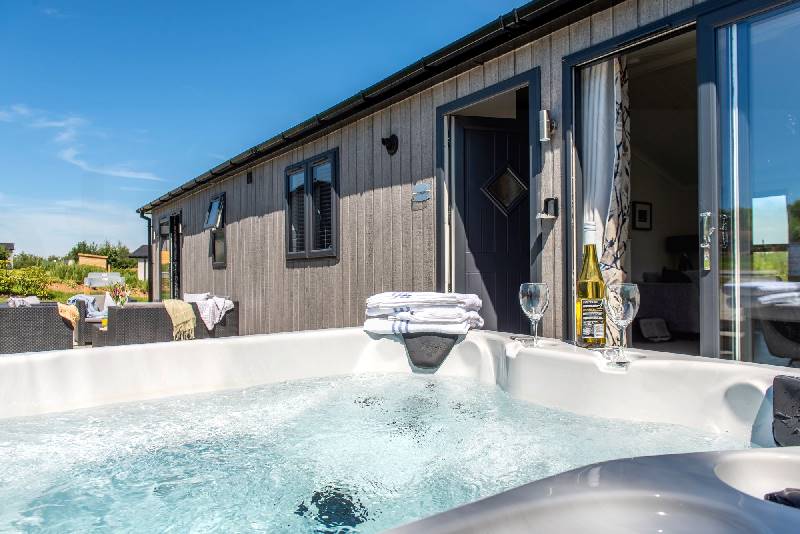Click here for more about Hornbeam Lodge, 19 Roadford Lake Lodges