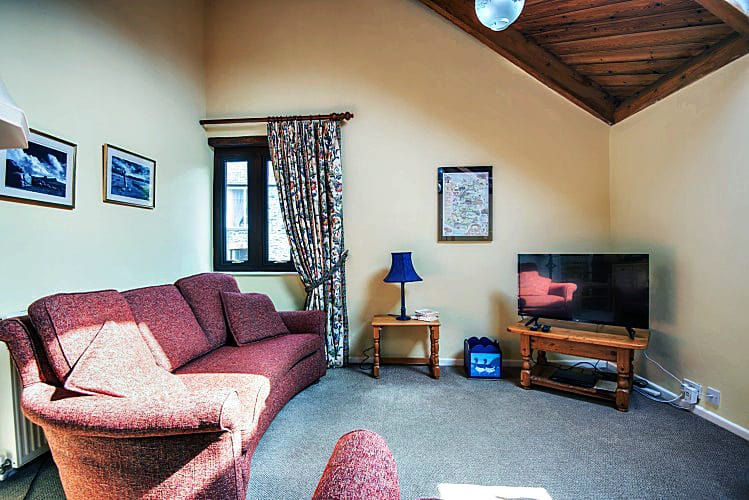 Click here for more about Badger Cottage, White Oxen Manor
